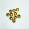 Set de 10 cuentas cilindro oro